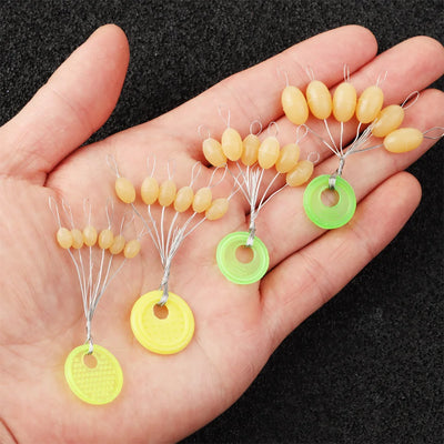 https://finsportz.com › products › 60pcs-10-set-s-m-l-big-line-stops-space-beans-fishing-tackle-sea-carp-fly-fishing-bait-sport-tool-float-catfish-round-float-ball
